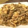 Orecchiette con carciofi e salsiccia
